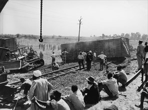 Aftermath of a train crash. An official photograph from the East African Railways and Harbours