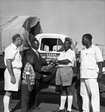 Handing over keys to a truck. A publicity photograph from the East African Railways and Harbours