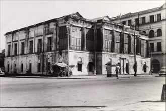 Sydney Webster's building. A delapidated building identified as 'Sydney Webster's building (taken)