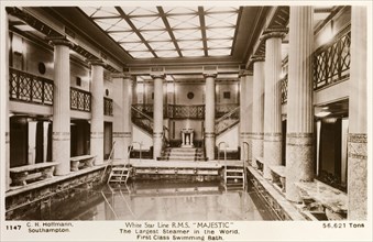 Swimming pool aboard the RMS Majestic. The grandiose interior of the first class swimming pool