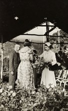 Royal visit to the Peradeniya Royal Botanical Gardens. Queen Elizabeth II is presented with flowers
