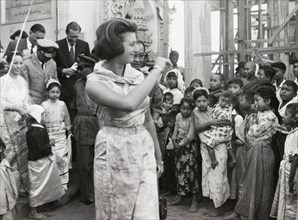 Princess Alexandra of Kent visits Mandalay. Princess Alexandra of Kent turns to wave to a crowd of