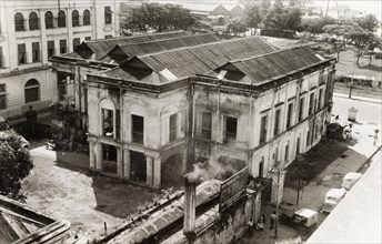 A colonial building in Rangoon. Exterior view of a large, two-storey building belonging to Sydney