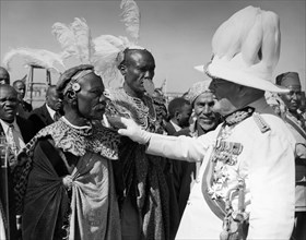 Sir Phillip Mitchell greets African chiefs. The Governor of Kenya, Sir Phillip Mitchell, greets