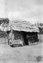 Small thatched classroom. A small thatched classroom constructed from thatch or other grass-like