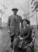 Charles Bungey and his wife. Charles Bungey and his wife dressed in outdoors clothes. Charles