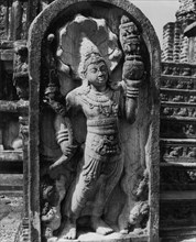 Carved guard stone. One of a pair of guardian deities carved in stone and positioned either side of
