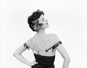 Profile shot of Daphne Dale. Profile portrait of dancer Daphne Dale in the role of Carmen. Dressed