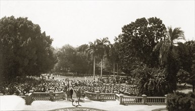 Memorial service for Sir Lee Stack. A crowd gathers in the gardens of Khartoum palace for the