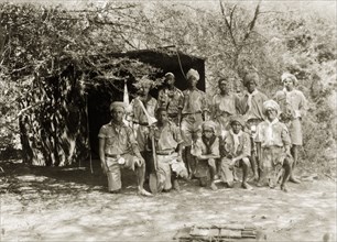 African scout group. A group of young African men at a scout camp. Each wears a uniform consisting
