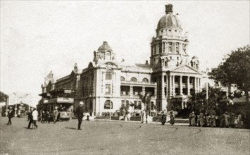 Durban town hall. Street scene outside the town hall in Durban city centre, showing a crowd of