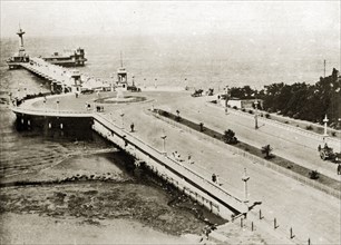 The pier at Cape Town. The pier at Cape Town dotted with pedestrians and the occasional horse-drawn