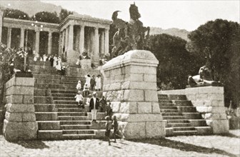 Rhodes monument at Cape Town. Tourists sit on the steps of the Rhodes monument, built in memory of