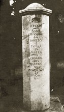 Zanzibar mile post. A stone mile post showing the distance in miles to various cities and towns in