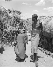Lepuipui with a Samburu woman. A Samburu man identified as 'Lepuipui' chats to a young Samburu