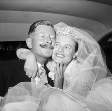 The Williams and McLaughlan couple. The newlywed Williams and McLaughlin couple pictured in the