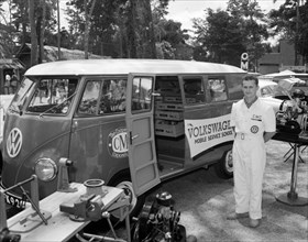 Cooper Motors at the Royal Show. A uniformed Volkswagen attendent stands beside a Volkswagen van