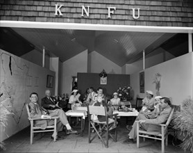 The KNFU at the Royal Show. A group of Europeans sit around tables at the KNFU (Kenya National