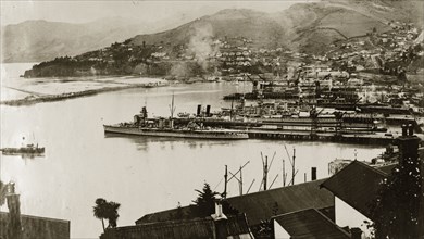 Naval ships at Lyttleton harbour. View across the harbour at Lyttleton showing the naval warships