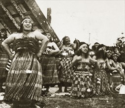 Maori singers. A group of Maori women perform a welcoming song dressed in their traditional costume