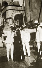 Guided tour of HMS Hood. Sir Laurence Field and Captain John Thurn, commanding aboard HMS Hood,