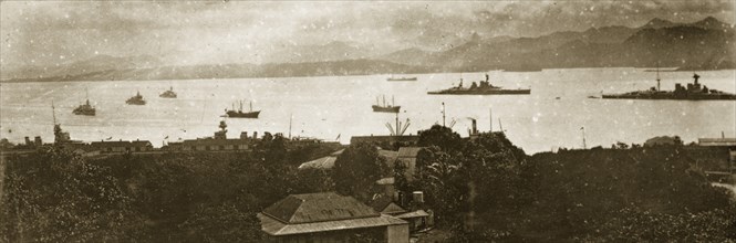 View of ships off Fiji harbour. Panoramic view of Fiji harbour, showing warships belonging to the