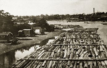Canadian boomlogging. Logs contained by booms float on a Canadian river. British Colombia, Canada,