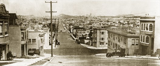 Taylor Street, San Francisco. Two and three storey buildings stretch away into the distance along a