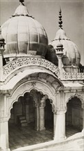 Exterior of the Moti Masjid. The striking marble domes of the Moti Masjid, or Pearl Mosque, at the