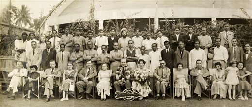 Staff at Telcalemit Ltd., Calcutta. Group portrait of the mixed race staff of Tecalemit Ltd. (TEC),