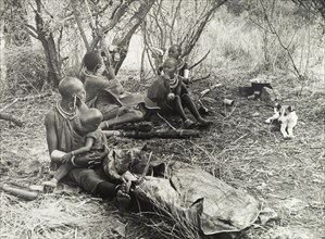 Maasai family group. Official publicity shot for the Tanganyikan government. Maasai women and