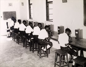 Tanganyikan students with microscopes. Official publicity shot for the Tanganyikan government. A