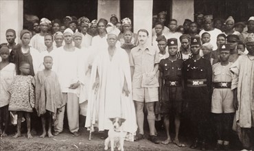 Cyril Iles with a Nigerian chief. British colonial officer, Cyril Iles, poses for the camera beside
