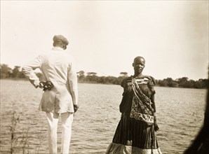 An African man and woman at the Zambezi River. Portrait of an African man and woman on the banks of