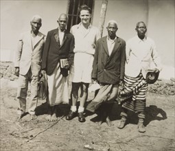 An English missionary with African priests. English Methodist missionary, Reverend Ian Lewis