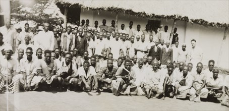 A Methodist mission in the Tana River area. A number of African men pose for a group portrait