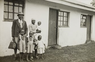 A theology student and his family, Kenya. A student of St. Paul's United Theological College in
