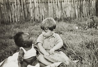 Anthony Lewis befriends an African baby. Anthony Lewis, a youngest son of English Methodist