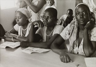 African women attend a missionary college. African women attend classes at a Methodist missionary