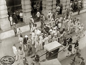 Assassination attempt on Sir Frances Henry May. Commotion on Pedder Street, moments after an