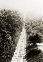 The Peak Tramway, 1903. View of the Peak Tramway, a funicular railway leading to Victoria Peak. The