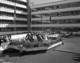 Opening ceremony of the Royal Technical College. Onlookers line the balconies as Princess Margaret
