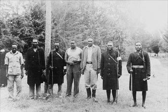 A farmer's Home Guard. Members of a European settler's Home Guard pose for the camera holding