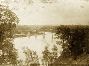 Indooroopilly bridge, Australia. View through trees of the Brisbane river, spanned by the Albert
