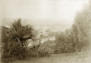 View from Wickham Terrace. A garden bench faces out over the city of Brisbane in the sloping