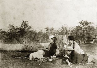 Enjoying a picnic, Australia. Outdoors portrait of members of the Brodribb family enjoying a picnic