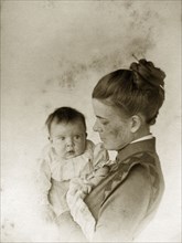 Ellen May Pughe and baby. Portrait of Ellen May Pughe holding her baby, one of her four children