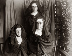Dressed up as nuns, Australia. Prunella ('Prue') Brodribb, pictured right, and two friends pose for