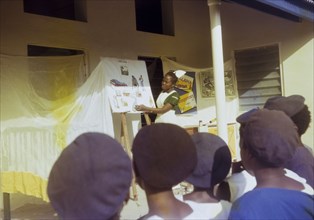 Open day at a Church of Nigeria hospital. A uniformed nurse working for a Church of Nigeria