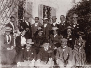 A British group in Morocco. A group of British men and women dressed in their best attire, line up